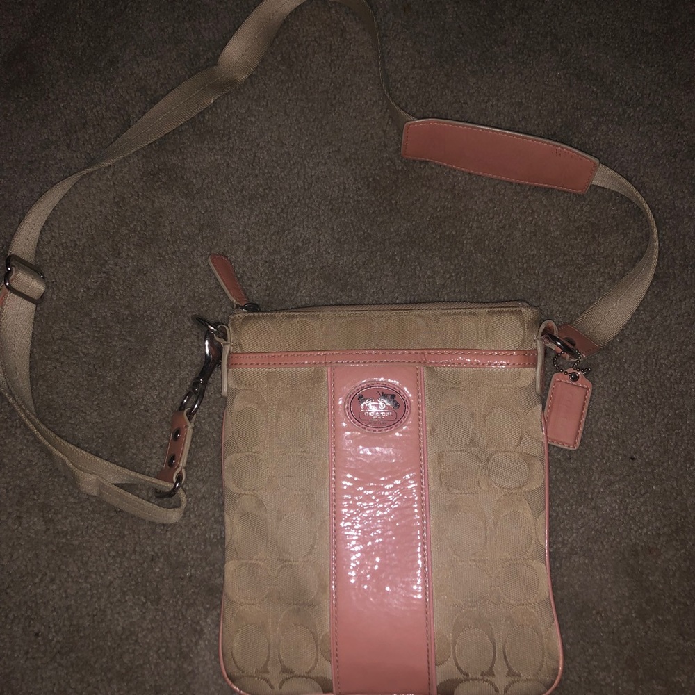 Pink and beige Coach crossbody purse